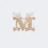 Crystal-adorned monogram brooch, optical white