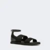 Flat sandals in leather and elasticated webbing, black Flat sandals in leather and elasticated webbing, black