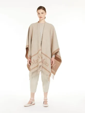 Jacquard wool poncho, beige Jacquard wool poncho, beige