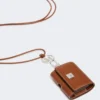 Leather earphone pouch, amber brown Leather earphone pouch, amber brown