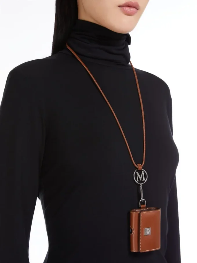 Leather earphone pouch, amber brown Leather earphone pouch, amber brown