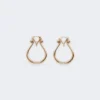 Monogram earrings in metal, gold