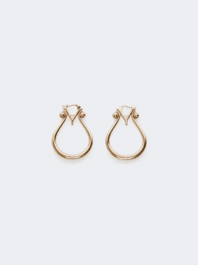 Monogram earrings in metal, gold