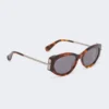Oval sunglasses, tawny bronze brown