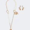 Set with charms and crystals, gold