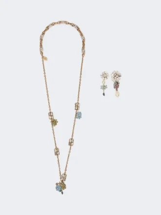 Set with flower and crystal details, gold Set with flower and crystal details, gold