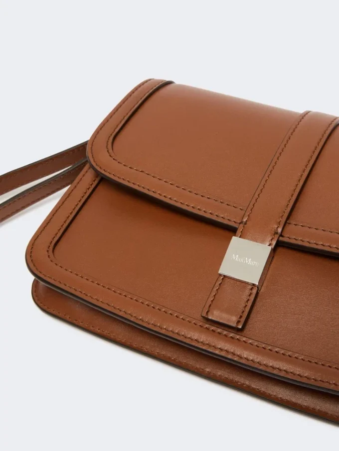 Smooth leather clutch, tobacco Smooth leather clutch, tobacco