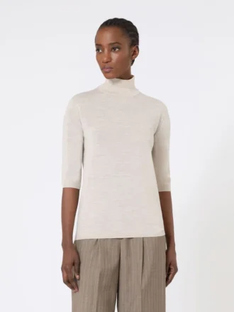 Stockinette-stitched wool polo-neck sweater, powder
