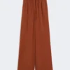 Wide-fit washed silk trousers, terra cotta